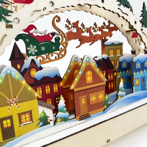 Détail du pont de Noël LED en bois avec silhouette du Père Noël et maisons lumineuses