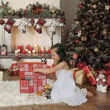 Christmas advent calendar with 24 drawers shown in a warm cozy festive living room setup