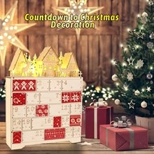 Close-up of LED lit wooden Christmas advent calendar with 24 drawers and reindeer scene