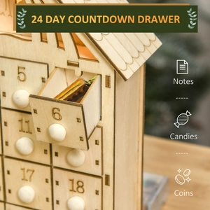 Close-up of number 6 drawer open with candy on wooden Christmas advent calendar box