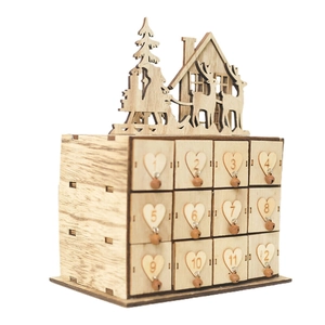 Detail of wooden advent calendar with 12 drawers featuring hearts and bells decoration