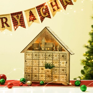Wooden Christmas advent calendar house with 24 drawers and warm LED lights