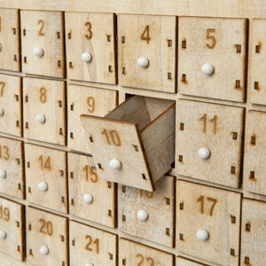 24-day countdown Christmas advent calendar made of natural wood with drawer pulls