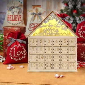 Lighted wooden house advent calendar with 24 numbered drawers for Christmas countdown