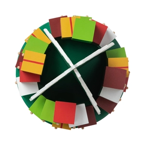 Top view of circular wooden advent calendar base with colorful painted compartments