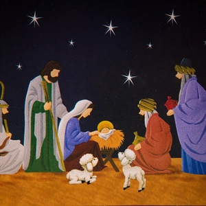 Wooden Christmas advent calendar with LED lights featuring a Nativity scene with figures