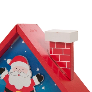 Close-up of wooden Christmas countdown calendar with Santa illustration and red chimney