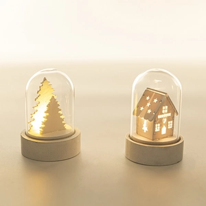 European Christmas glowing wood house in glass dome with warm LED night light decoration