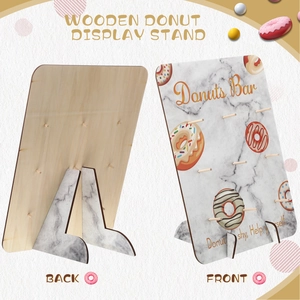 Front and back detail of a marble patterned wooden donut display stand with support legs