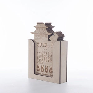 Detail of 3D laser-cut wooden perpetual calendar featuring traditional Chinese architecture