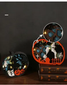 Détail de la lampe boîte à ombre citrouille d'Halloween en bois avec éclairage LED chaleureux