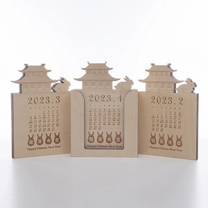 Macro shot of 2023 Rabbit Year wooden perpetual calendar with detailed laser-cut carvings