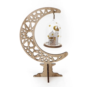 Detailed view of hollow wooden moon stand with hanging glass mosque ornament