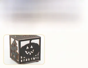Detail view of a Halloween wooden light box with pumpkin and castle cutouts