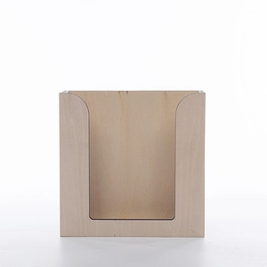 Close-up of minimalist natural wood organizer box with U-shaped cutout for easy access