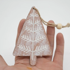 Rustic wooden Christmas tree ornament with white branch patterns and a hanging jute rope