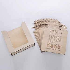 Detail of wooden perpetual calendar with Chinese zodiac rabbit and pavilion laser carvings