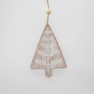 Close-up of minimalist wooden Christmas tree ornament with white branch patterns