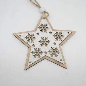 Detail of wooden star ornament with white glitter finish and hollow snowflake design