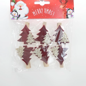 Set of 6 red wooden Christmas tree clips with gold glitter detail in packaging