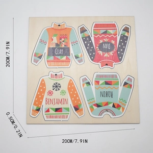 Detailed view of four wooden sweater ornaments on a square frame with custom names