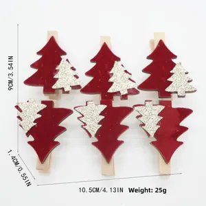 Detailed view of red and gold glitter wooden Christmas tree clips for festive decor