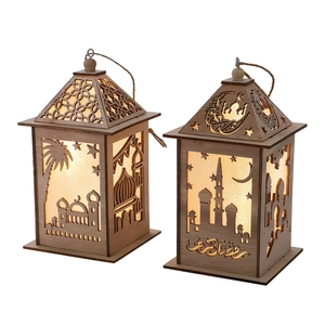 Close-up of wooden Ramadan lanterns with laser-cut mosque patterns and LED warm light