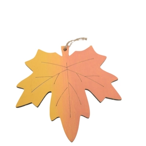 Handcrafted maple leaf wooden ornament with orange gradient and natural twine hanger