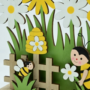 Detailed layered wooden Easter bee decor with 3D daisies and rustic honeycomb design