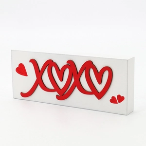 Romantic XOXO wooden tabletop decoration with red 3D hearts for Valentine's Day