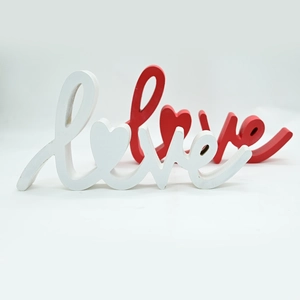 Red and white wooden LOVE sign set with heart design for wedding and home decor