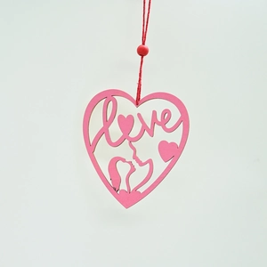 Detail of pink wooden heart-shaped Ferris wheel ornament with love lettering and red string