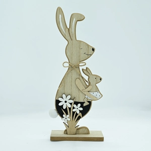 Detail of wooden Easter bunny figurine with natural grain, hemp rope, and a plush pompom