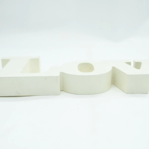 Side view of white 3D Love letter sign decoration for wedding and home tabletop