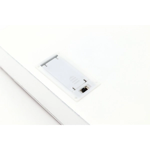 Détail du dos de l'ornement LED blanc avec compartiment à piles et interrupteur