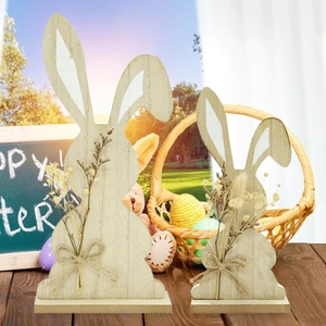 Set of two rustic wooden Easter bunnies with twine bows for Nordic tabletop decor