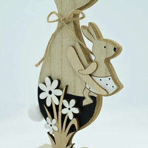 Rustic layered wooden Easter bunny decor with jute bow and white polka dot dress detail