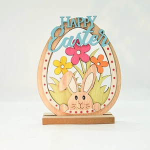 Detail of wooden Easter egg craft with bunny floral design and Happy Easter text