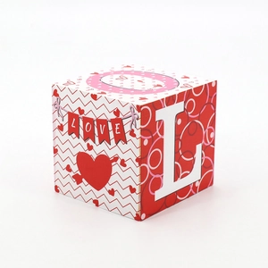 Romantic Valentine square wooden block decor with red hearts and LOVE banner lettering