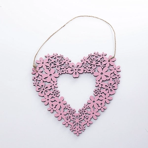 Detailed view of pink heart floral wooden hanging ornament with natural hemp rope