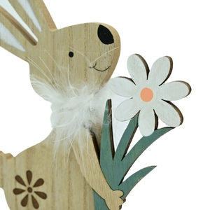 Easter wooden bunny ornament with feather collar and floral detail on white background