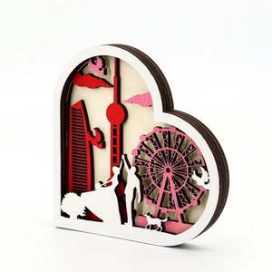 3D layered wooden ferris wheel heart decoration with romantic city silhouette