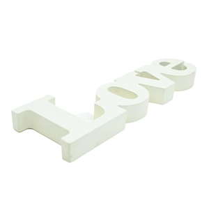 Minimalist white wooden LOVE letter sign for romantic home decor and wedding tabletop