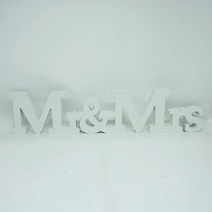 Close-up of white wooden Mr & Mrs letters for wedding decor and home table ornaments