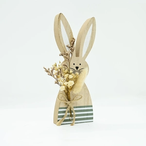 Close-up of Easter wooden bunny decor with natural grain, dried flowers and jute bow detail