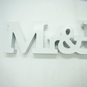 Close-up of white wooden MR & MRS wedding decoration letters for party tabletop