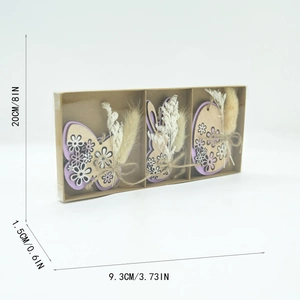 Detail view of wood Easter ornaments set in packaging with dimensions 9.3x20x1.5 cm