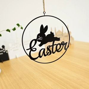 Rustic black metal Easter wreath hanging decoration with rabbit silhouette and hemp rope