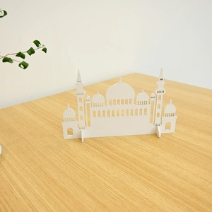 Close-up of white wooden mosque silhouette decoration with two detachable support stands
