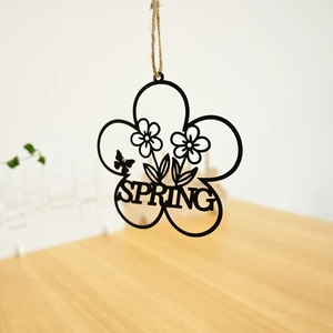 Rustic metal Easter wreath with bird and butterfly cutout Spring hanging decor